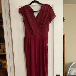 Red jumpsuit. Never worn. New with tags.